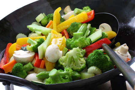 stir-fried vegetables in a chinese wokの写真素材