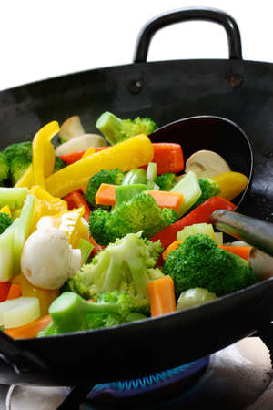 stir-fried vegetables in a chinese wokの写真素材