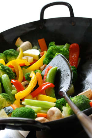 stir-fried vegetables in a chinese wokの写真素材