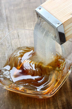 pushing out tokoroten gelidium jelly ,  japanese summer food