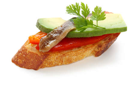 pincho,  spanish canape with anchoy,avocado and paprikaの写真素材