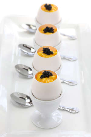 caviar and scrambled egg in egg shell cupの写真素材
