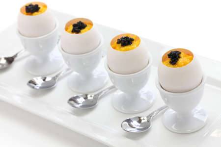 caviar and scrambled egg in egg shell cupの写真素材