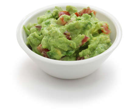 guacamole dip in bowl isolated on white backgroundの写真素材