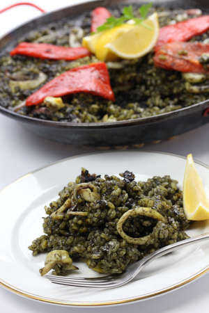 squid ink paella, spanish dishの写真素材