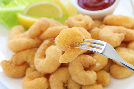 popcorn shrimp on forkの写真素材