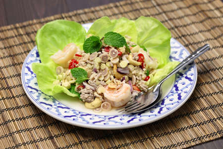 spicy lemongrass salad, yam takrai, thai cuisineの写真素材