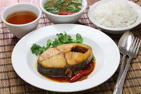com ca thu kho, rice with king mackerel simmered in caramelized sauce, vietnamese cuisineの写真素材