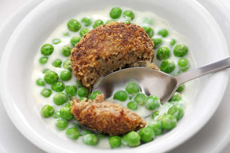 green peas fozelek thich vegetable stew and fasirt fried meatball, hungarian cuisine