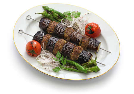 Eggplant kebab, patlican kebab and Turkish cuisine isolated on white backgroundの写真素材