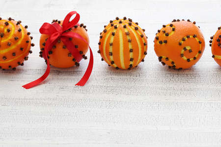clove orange pomander balls, homemade christmas giftの写真素材