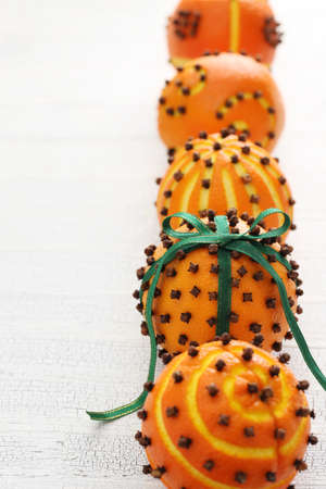 clove orange pomander balls, homemade christmas giftの写真素材