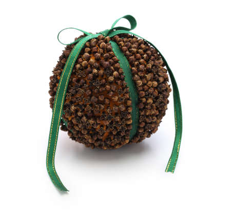 Spiced orange pomander ball, scented christmas decorationの写真素材