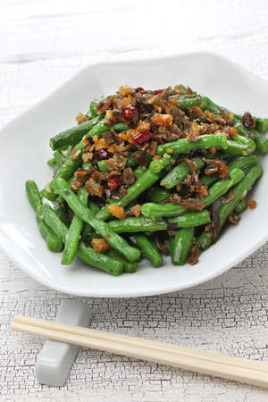 Gan bian dou jiao, dry fried green beans and chinese sichuan cuisineの写真素材