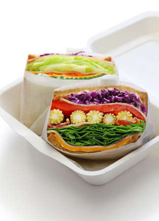 homemade thick veg sandwich isolated on white backgroundの写真素材