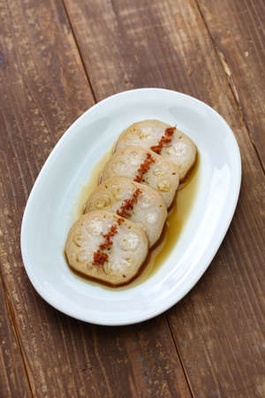 osmanthus flavored, stuffed lotus root with glutinous rice, chinese foodの写真素材