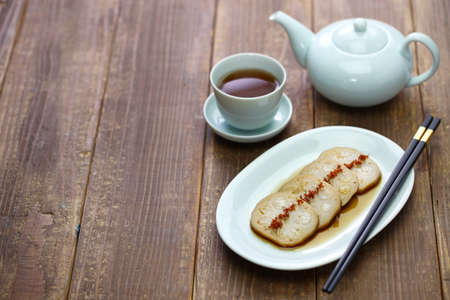 osmanthus flavored, stuffed lotus root with glutinous rice, chinese foodの写真素材