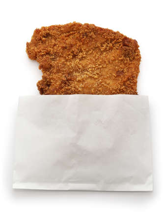 homemade Taiwanese style big fried chicken in a paper bagの写真素材