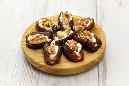 stuffed dates with cream cheese and nutsの写真素材