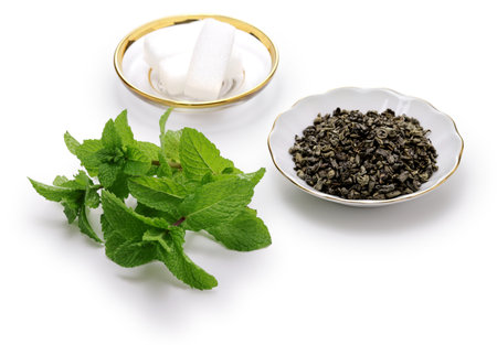 traditional Moroccan mint and sugar tea with a silver teapotの写真素材