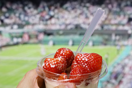 strawberries and cream, a small bowl, English summer specialtyの写真素材