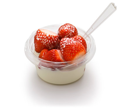 strawberries and cream, a small bowl, English summer specialtyの写真素材