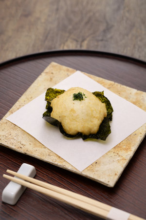 Yamaimo no isobe-age ( Grate Japanese yam and put it on top of Nori seaweed and then deep-fried ), Japanese cuisineの写真素材