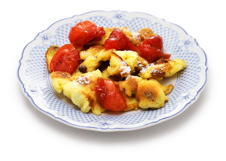 Kaiserschmarren mit Pflaumenkompott, Austrian fluffy scrambled pancake with plum compoteの写真素材
