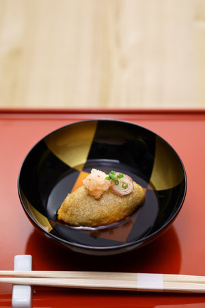 soba-gaki no agedashi, crispy fried buckwheat dumpling with dashi-based sauce. Japanese soba cuisineの写真素材