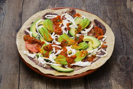 homemade open face vegetable tlayuda(before charcoal grilling), Mexican pizzaの写真素材