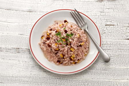 Risotto with burgundy color sweet cornの写真素材