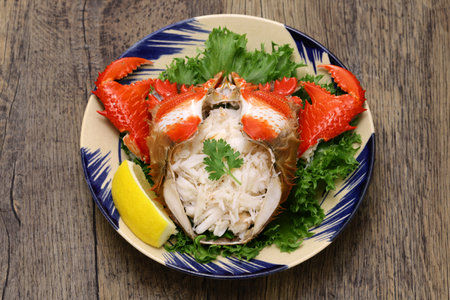 Boiled spanner crab ( red frog crab ). Crab meat is loosened and stuffed into the crab shell.の写真素材