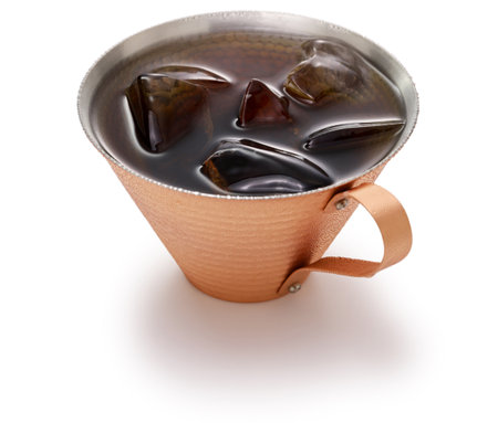 cold brew coffee in a copper cup.の写真素材