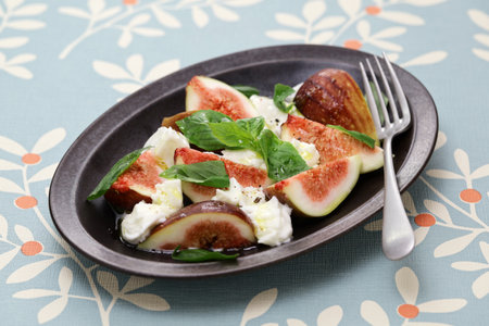 fig caprese salad(fig, mozzarella and basil)の写真素材