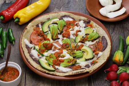 homemade open face vegetable tlayuda(before charcoal grilling), Mexican pizzaの写真素材