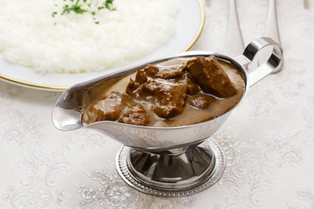 Japanese-style beef curry rice ( curry and rice are served separately)
Japanese curry is always served with rice.の写真素材