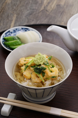 Tencha, a Japanese Tempura dish.
A rice dish that is eaten by placing shrimp kakiage on top of rice and pouring dashi soup over it. The last dish at the tempura restaurant.の写真素材