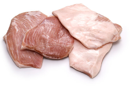 pork jowl meat isolated on a white backgroundの写真素材