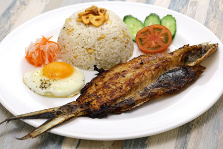 Bangsilog (milkfish, fried rice, and egg), traditional Filipino breakfastの写真素材