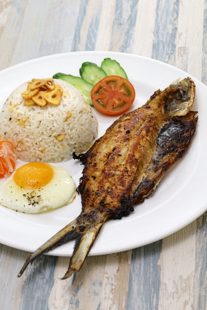 Bangsilog (milkfish, fried rice, and egg), traditional Filipino breakfastの写真素材