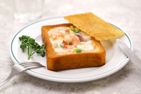 coffin bread, Taiwanese food.
It is white bread that has been fried in oil, with the center hollowed out and stuffed with seafood chowder.の写真素材