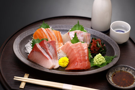 assorted sashimi; tuna(medium fatty), salmon, yellowtail, and sea bream. authentic Japanese dining.の写真素材