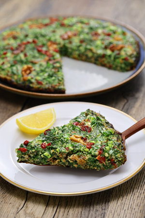 Kuku sabzi (Persian herb frittata), vegetarian Iranian foodの写真素材