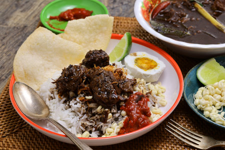nasi rawon, black beef soup with rice.  Indonesian cuisine.の写真素材