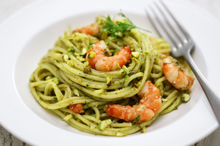 Sicilian pasta with pistachio pesto and shrimp, Italian cuisineの写真素材