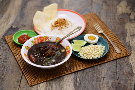 nasi rawon, black beef soup with rice.  Indonesian cuisine.の写真素材