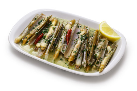 steamed razor clams in wine isolated on white backgroundの写真素材