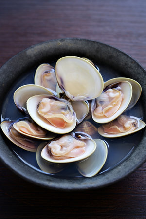 steamed Hamaguri clams with Japanese rice wine (sake).の写真素材