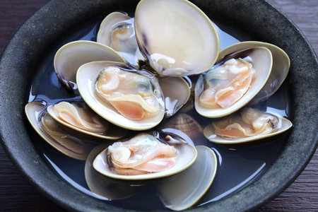 steamed Hamaguri clams with Japanese rice wine (sake).の写真素材