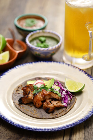 "Tacos al pastor" made with homemade blue tortillas. Mexican foodの写真素材